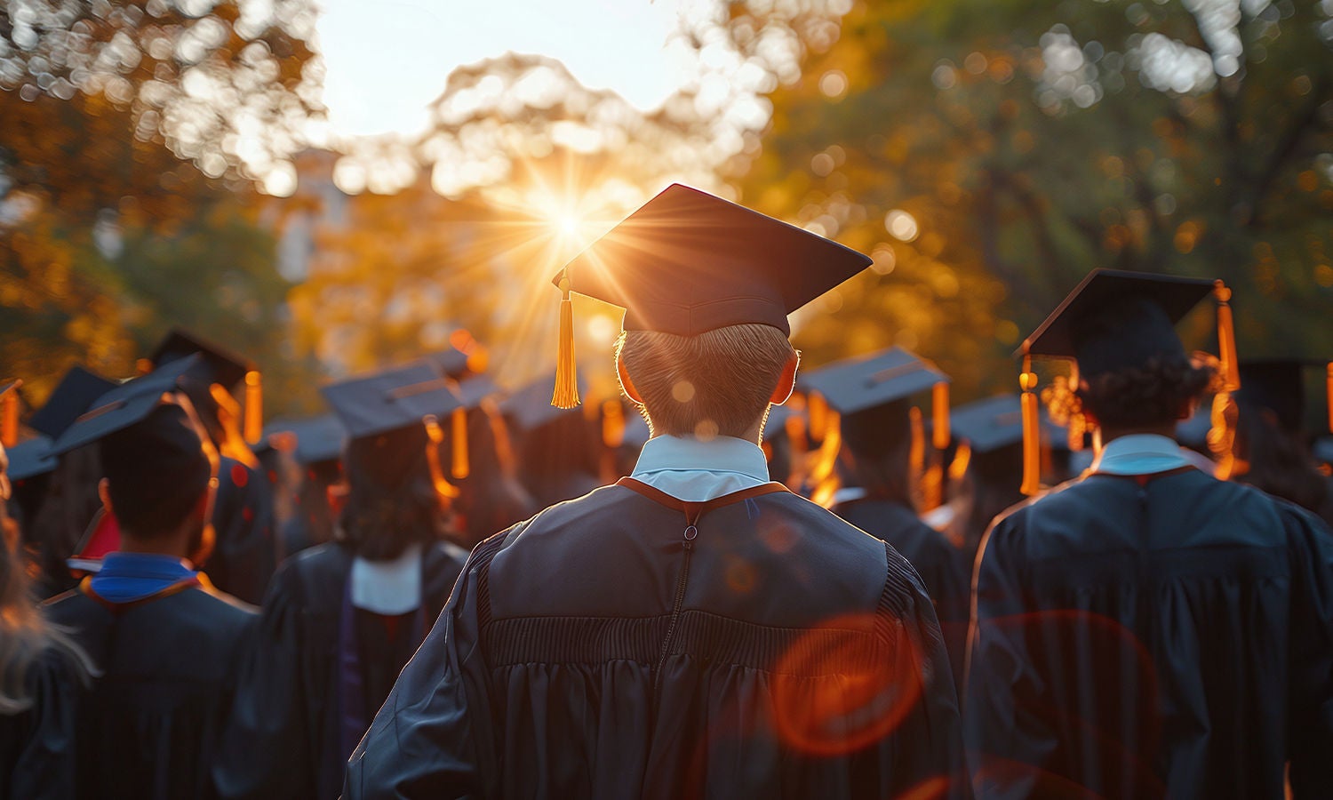 A group of people in graduation caps and gowns​
